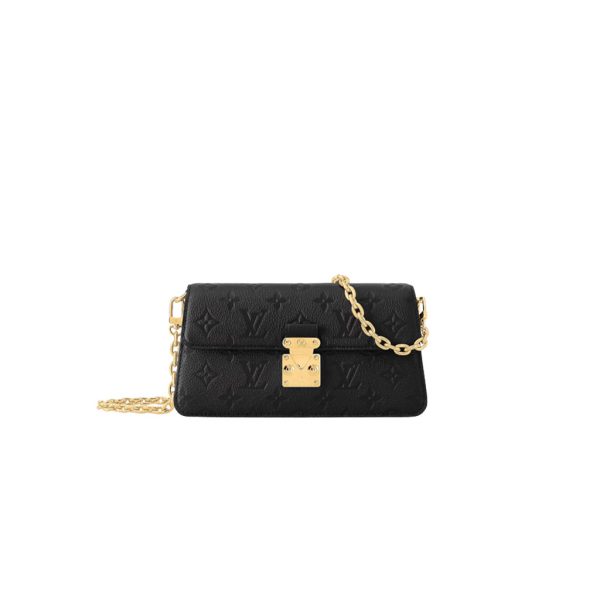 Wallet On Chain Métis: Sophistication Meets Heritage. The Metis Wallet on Chain is a testament to craftsmanship, fashioned from exquisitely grained Monogram Empreinte leather, bearing Louis Vuitton's iconic Monogram pattern with precision. Its chic trapezoidal silhouette and front flap, fastened by an elegant S-lock clasp, pay homage to the heritage of Louis Vuitton's iconic trunks. With a removable chain that offers versatile cross-body wear, this bag seamlessly blends timeless style with modern functionality.