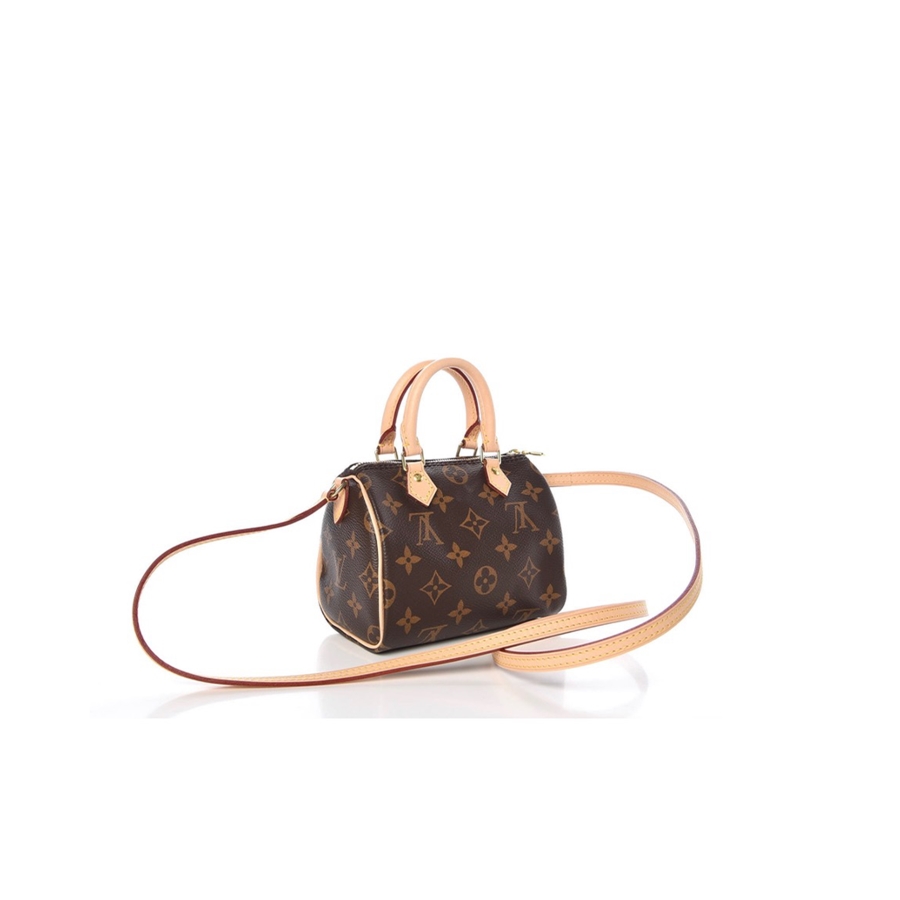 LOUIS VUITTON Nano Speedy Bag. Original Quality Bag including gift box, care book, dust bag, authenticity card. This bag is a perfect miniature version of Louis Vuitton's iconic Speedy bag. Crafted from Monogram canvas with natural leather trim, it features two handles and a long strap for shoulder or cross-body carry. Extremely lightweight and large enough for a smartphone, cards and keys, it is a stylish way to carry essentials.