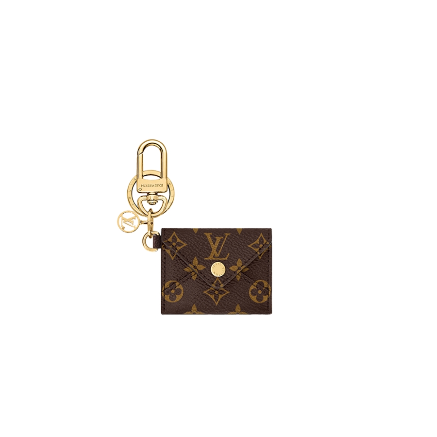 LOUIS VUITTON Kirigami Pouch Bag Charm & Key Holder. Original Quality Charm including gift box, care book, dust bag, authenticity card. Practicality and elegance fuse effortlessly in this pouch bag charm and key holder. The versatile design, finished in iconic Monogram canvas, features a functional pouch with a snap button opening. Immaculate detailing includes a suede lining and House emblems such as an LV Circle charm and signature engraving.
