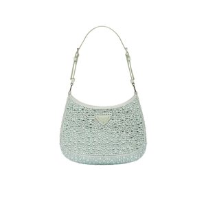 PRADA Cleo Satin Bag With Crystals. Original Quality Bag including gift box, care book, dust bag, authenticity card. Feminine, elegant and modern, the Prada Cleo bag is made of satin and embellished with luminous crystals of different sizes that give the bag refined charm. The sinuous shape that recalls archive styles makes the accessory iconic.