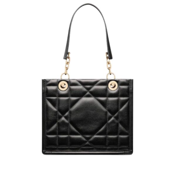 DIOR Essential Tote Bag. Original Quality Bag including gift box, care book, dust bag, authenticity card. A new House staple debuted at the Fall-Winter 2022-2023 ready-to-wear fashion show, the Dior Essential tote bag presents a functional design with modern elegance. Crafted in satin-finish calfskin, it is adorned with the Archicannage motif offering a new take on the iconic House topstitching. The spacious interior features three patch pockets and one zipped pocket to accommodate all of the essentials. Featuring leather and pale gold-finish metal chain top handles, the tote may be worn over the shoulder or carried by hand as an ideal daily companion.