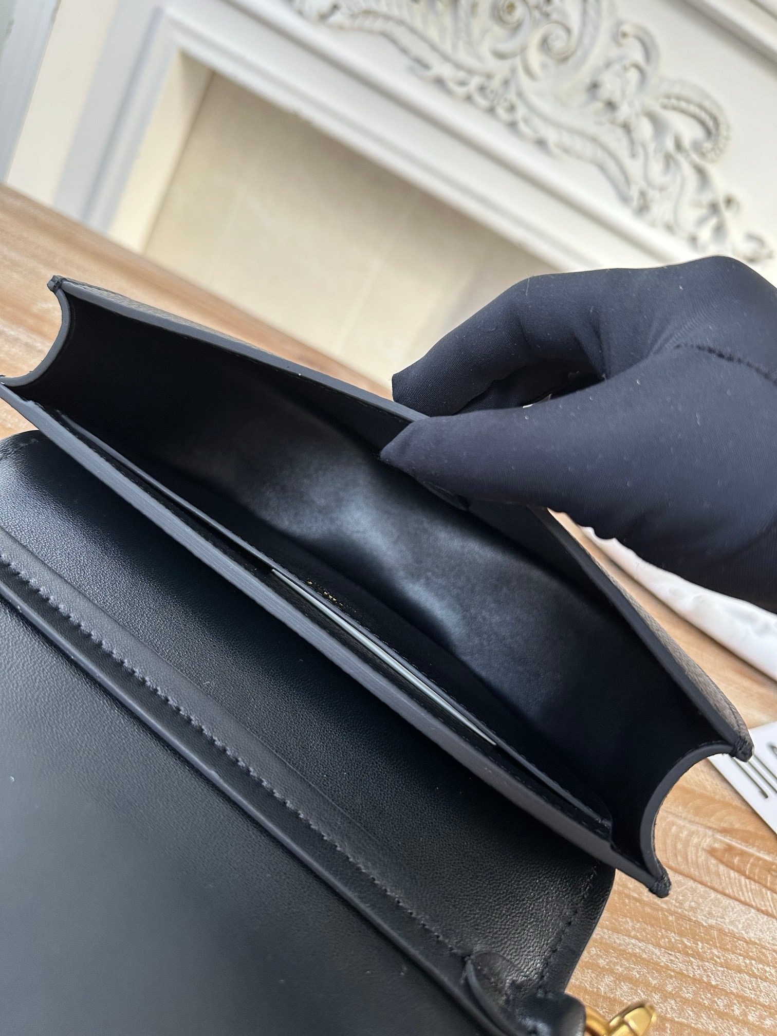 Marcie Chain Flap Bag. Authentic quality luxury bag crafted in genuine leather comes with authenticity card, dust bag and gift bag. Elevating Iconic Elegance: Marcie Line Redefined. Experience a fresh take on *loé's iconic Marcie line with this exquisite chain flap bag, meticulously crafted from a captivating blend of nappa lambskin, grained calfskin, and sumptuous suede. The line's signature hardware undergoes a graceful transformation, now adorned with *loé's engraved jewelry hallmark, adorning the flap with sophistication. An intricately hand-braided top handle pays homage to another hallmark Marcie feature, while a gracefully extended chain strap adds a refined touch. Whether you choose to drape it over your shoulder or wear it cross-body during the day, or opt to detach the strap and carry it by hand for a sophisticated evening ensemble, this flap bag is a versatile masterpiece. *loé's Marcie bag line effortlessly melds a feminine aesthetic with the free-spirited vibe of the '70s. An equestrian-inspired allure takes center stage, elevated by the allure of gleaming gold-toned hardware, resulting in a distinctly feminine yet timelessly chic look.