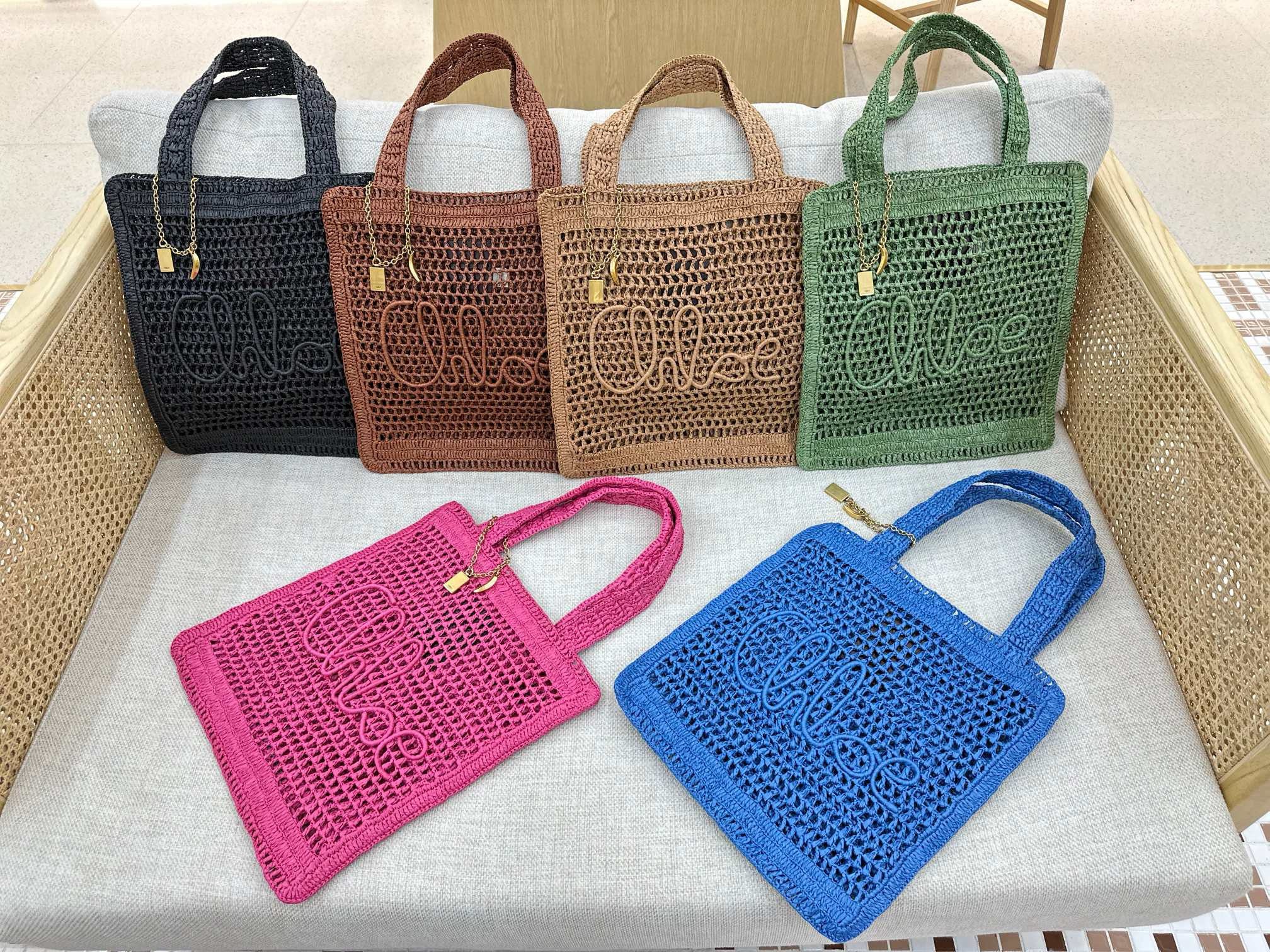 Summer Banana Tote Bag. Authentic quality luxury bag crafted in genuine leather comes with authenticity card, dust bag and gift bag. Heritage in Hand: Where Artisan Craft Meets Summer Elegance. Introducing the Summer Banana Tote—an artisanal masterpiece crafted from raffia and calfskin by a single artisan over 4.5 days in partnership with Made For A Woman. This spacious tote is adorned with a handwritten signature inspired by *loé’s rich heritage, while a playful dangling chain and delicate charms add the perfect finishing touch. A celebration of craftsmanship and effortless summer style.