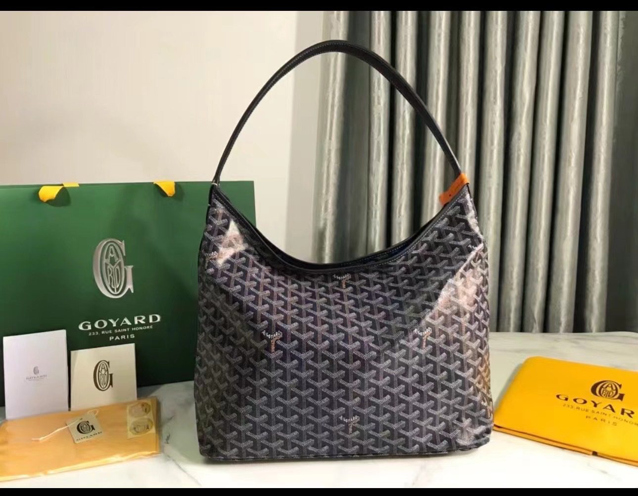 Bohème Hobo Bag. Authentic quality luxury bag crafted in genuine leather comes with authenticity card, dust bag and gift bag. Wander Freely. Carry Elegantly. Introducing the *yard Bohème Hobo Bag—a tribute to Parisian spirit and wanderlust. Inspired by the timber raftsmen’s humble travel pouches, this bag blends heritage storytelling with everyday luxury. Crafted to be exceptionally lightweight and flexible, it drapes effortlessly on your shoulder with a wide, comfortable handle designed for long city strolls or spontaneous weekend escapes. Its beauty lies not only in its sleek silhouette but also in its thoughtful functionality. The secure zip closure keeps your essentials safe, while the removable snap-fastened pouch doubles as a chic clutch or wallet—perfect for a quick dash or stylish switch-up. Whether you’re wandering through cobblestone streets or navigating your daily routine, the Bohème ensures your essentials are always within reach. This is not just a bag—it’s your elegant partner in carefree adventures.