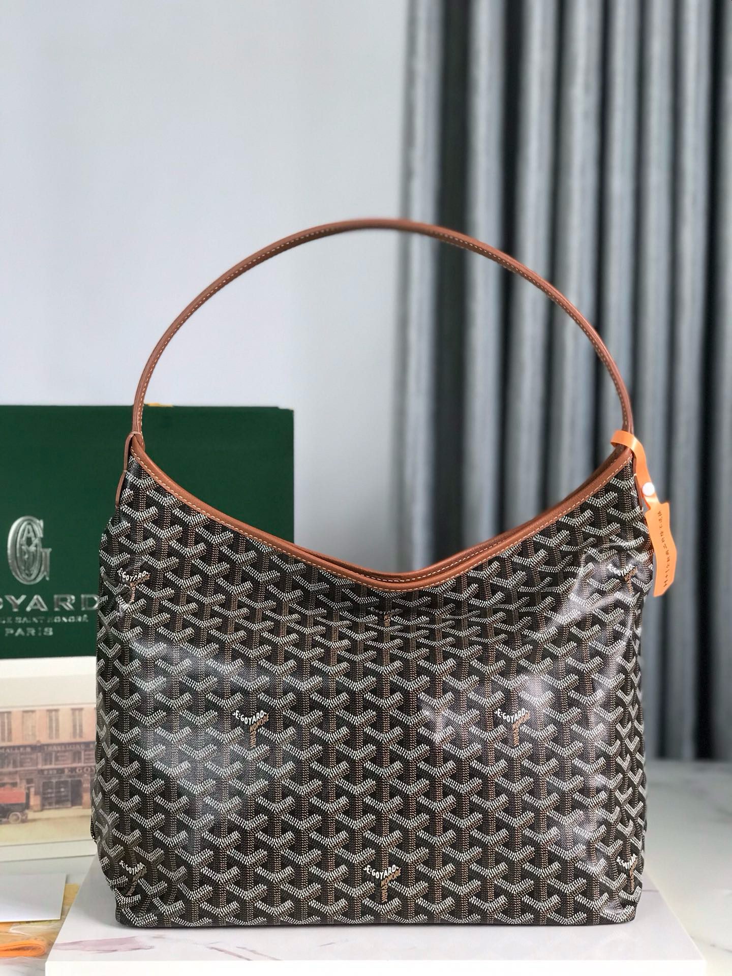 Bohème Hobo Bag. Authentic quality luxury bag crafted in genuine leather comes with authenticity card, dust bag and gift bag. Wander Freely. Carry Elegantly. Introducing the *yard Bohème Hobo Bag—a tribute to Parisian spirit and wanderlust. Inspired by the timber raftsmen’s humble travel pouches, this bag blends heritage storytelling with everyday luxury. Crafted to be exceptionally lightweight and flexible, it drapes effortlessly on your shoulder with a wide, comfortable handle designed for long city strolls or spontaneous weekend escapes. Its beauty lies not only in its sleek silhouette but also in its thoughtful functionality. The secure zip closure keeps your essentials safe, while the removable snap-fastened pouch doubles as a chic clutch or wallet—perfect for a quick dash or stylish switch-up. Whether you’re wandering through cobblestone streets or navigating your daily routine, the Bohème ensures your essentials are always within reach. This is not just a bag—it’s your elegant partner in carefree adventures.