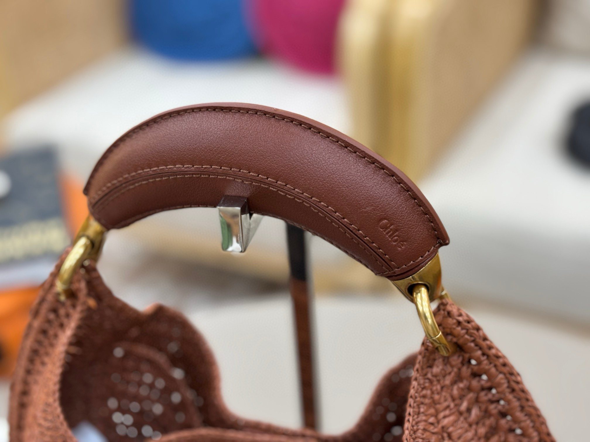 Summer Banana Hobo. Authentic quality luxury bag crafted in genuine leather comes with authenticity card, dust bag and gift bag. Artisanal Spirit, Curved in Style. Say hello to sunshine in bag form. The *LOÉ Summer Banana Hobo Bag is a joyful blend of craftsmanship and creativity, handwoven over four days by a single artisan in collaboration with Made For A Woman. This is not just a bag—it’s a story stitched in raffia and trimmed in luxurious calfskin. Its curved, banana-inspired silhouette hugs the shoulder with ease, while the sculptural handle and handwritten signature nod to *loé’s heritage of effortless elegance. Light, natural, and undeniably chic, it's the perfect companion for sun-soaked escapes or city strolls with a coastal state of mind. A celebration of craftsmanship, femininity, and the art of slow fashion.